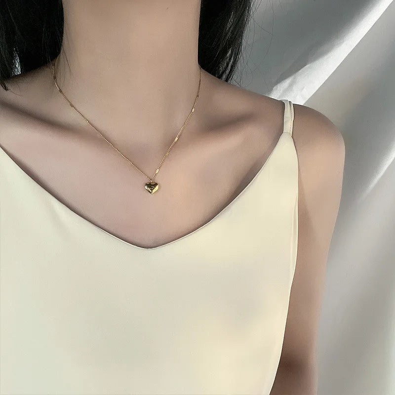 Collier pendentif cœur en métal plaqué or pour femme