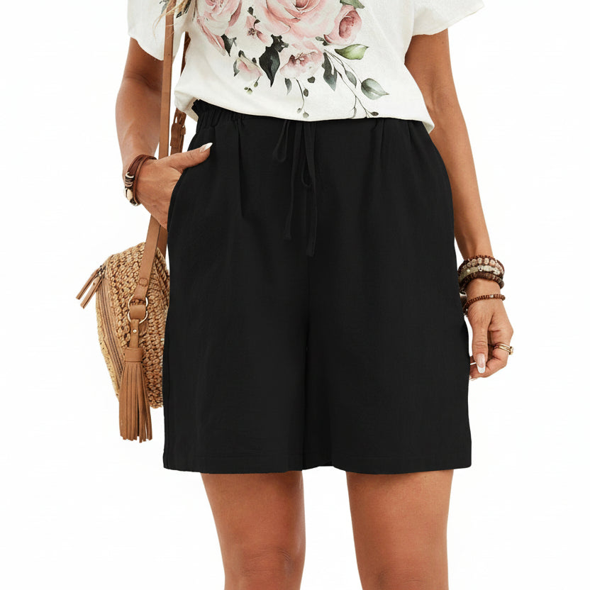 Short en lin pour femme couleur unie, coupe ample avec cordon. Parfait pour un look décontracté et léger au printemps-été.