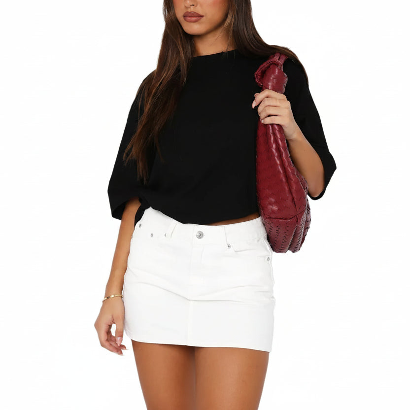 Mini-jupe denim femme extensible, style rétro décontracté. Idéale pour un look casual et tendance