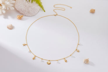 Chaîne de taille bikini femme style plage été – pendentifs coquillage, étoile de mer et perles