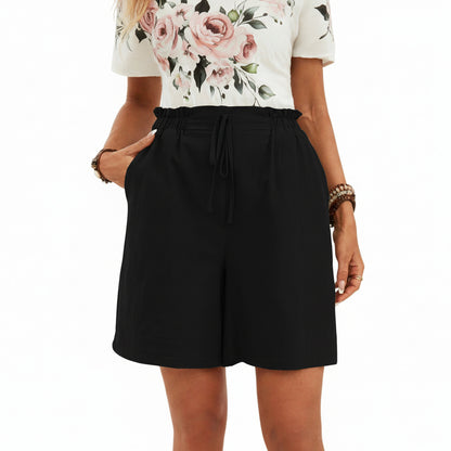 Short en lin pour femme couleur unie, coupe ample avec cordon. Parfait pour un look décontracté et léger au printemps-été.