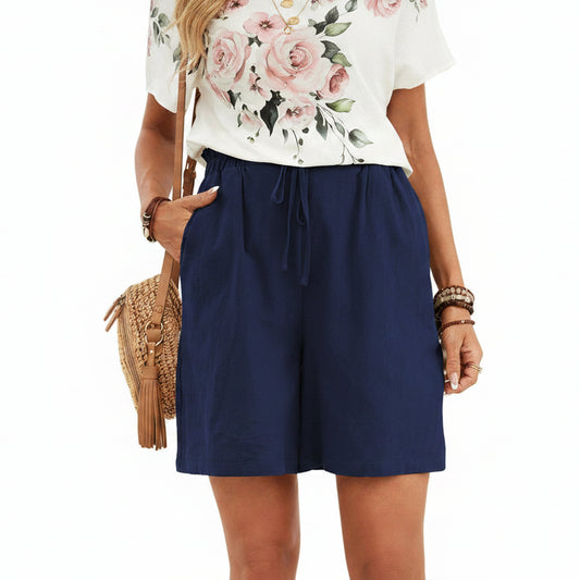 Short en lin pour femme couleur unie, coupe ample avec cordon. Parfait pour un look décontracté et léger au printemps-été.