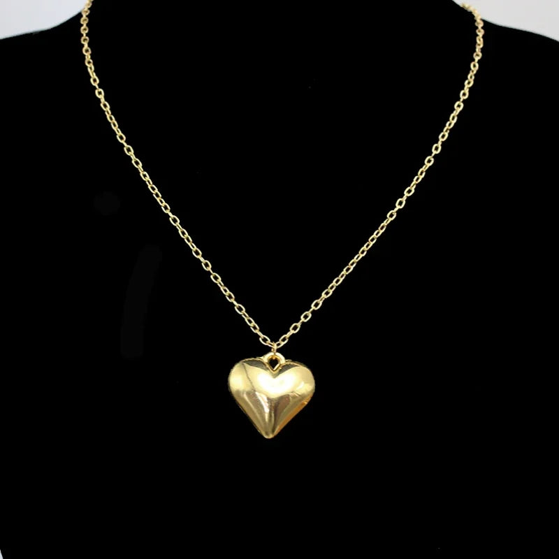 Collier pendentif cœur en métal plaqué or pour femme