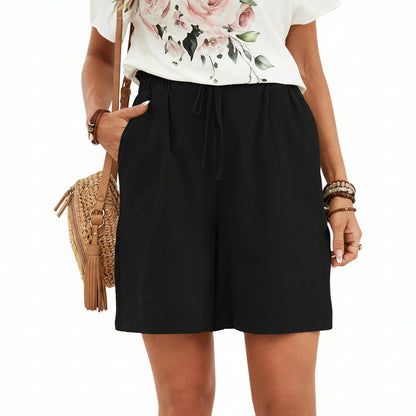 Short en lin pour femme couleur unie, coupe ample avec cordon. Parfait pour un look décontracté et léger au printemps-été.